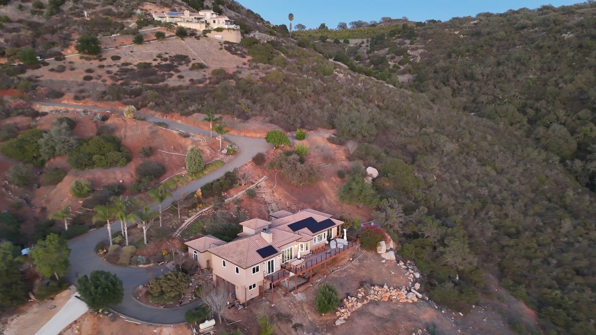Aerial view of a solar home on a hillside near Escondido, San Diego County